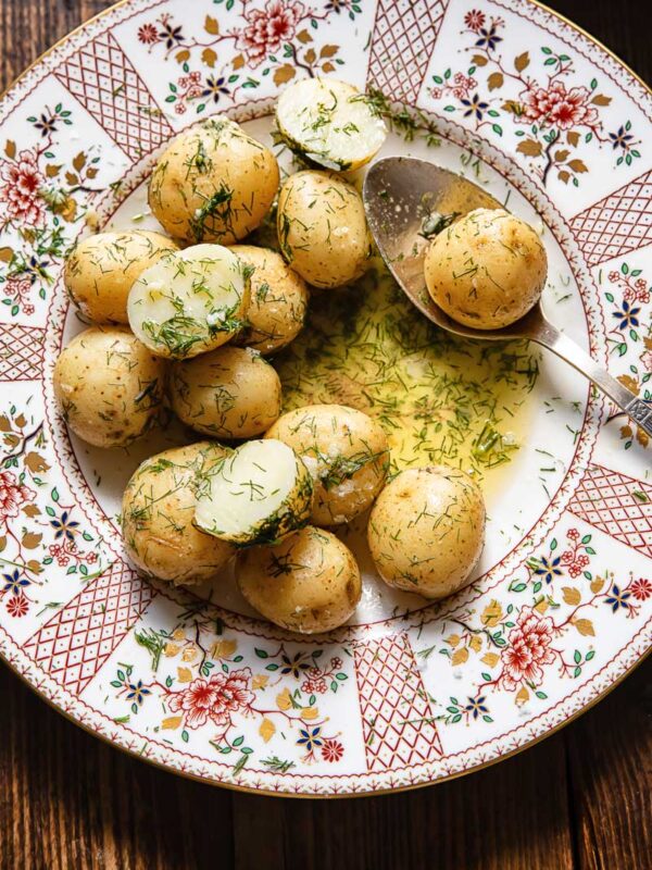 Close up of a serving of garlic butter potatoes