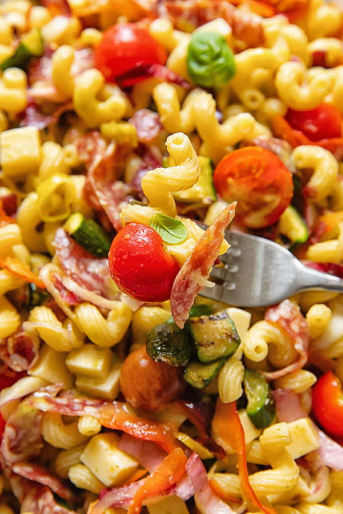 vertical extreme close up shot of Italian pasta salad